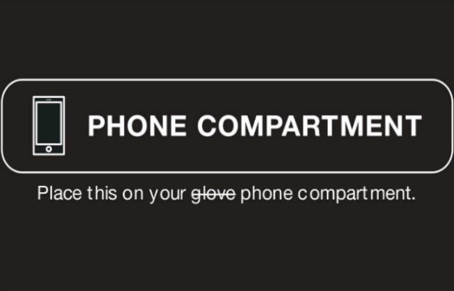 A sticker reading "Phone Compartment" to put on your glove compartment.