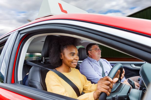 pupil driving in a car with an adi